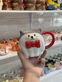 تصویر گربه پاپیون قرمز 