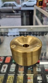 تصویر زیر سیگاری فلزی طلایی 