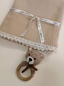تصویر د‌ورپیچ نوزادی موسلین - پتوموسلین کرم Baby blanket