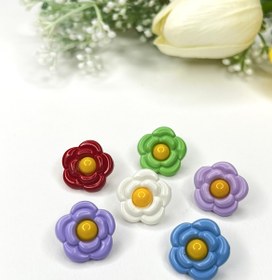 تصویر دکمه بچگانه گل پلاستیکی 