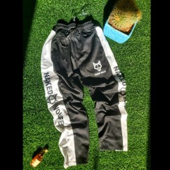 تصویر شلوار بچگانه بگ خط پهن فلامنت 