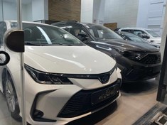 تصویر تویوتا کرولا 1800cc هیبرید سفید صفر کیلومتر ا Toyota Corolla Toyota Corolla