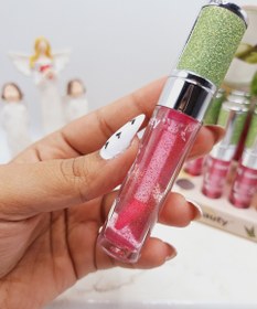 تصویر برق لب شاینی صورتی با تقویت کننده لب حاوی روغن لب آلوئه ورا بسیار خوش رنگ برند 3Q beauty 3Q beauty lip oil