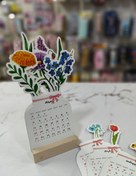 تصویر تقویم استند دار طرح گلدون 