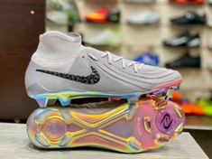 تصویر کفش فوتبال نایکی فانتوم GX 2 لونا با چسبندگی بالا و کنترل بی‌نظیر 