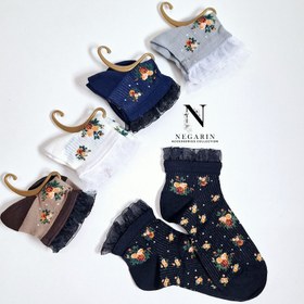 تصویر جوراب طرح گل برجسته 