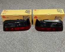 تصویر چراغ خطر پارس ELX دودی تیره جمع ساز ( چپ و راست باهم) 