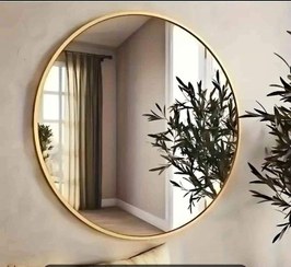 تصویر آینه دیواری گرد مدرن از جنس فلز 