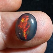 تصویر اوپال سیاه با تلألوی آتشین، بلک اپال فول تلألو 