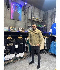 تصویر کت فوتر مردانه در رنگ‌بندی با تضمین کیفیت گرم بالا Men's footer jacket in a color scheme with quality assurance