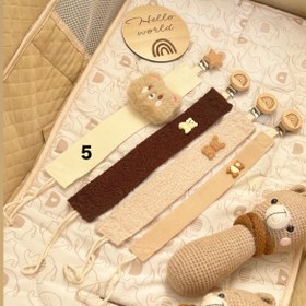 تصویر بند پستانک پارچه ای عروسکی 