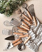 تصویر ابزار آشپزخانه سر استیل با دسته چوبی 