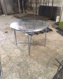 تصویر میز گرد با پایه تاشو 