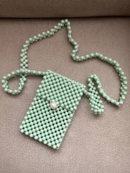 تصویر کیف مرواریدی طرح موبایل 