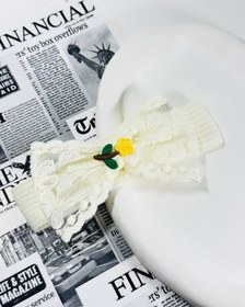 تصویر هدبند توری طرح دار 