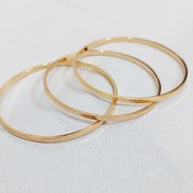 تصویر النگو آیینه ای برند ژوپینگ طلایی مشابه طلا سایز 2 و 3 