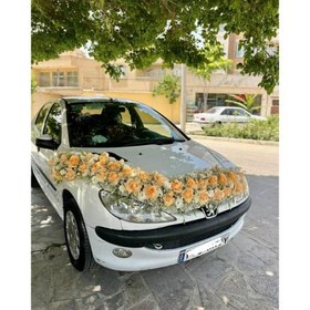 تصویر ماشین عروس 206 تزیین با گل های طبیعی 5008 