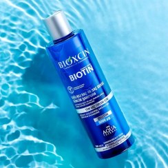 تصویر شامپو ضد ریزش بیوکسین حاوی بیوتین (Biotin) - تقویت کننده و ضخیم کننده مو واردات قانونی ارسال از منطقه آزاد ارس 