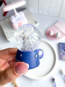 تصویر گوی شیشه ای فضانورد 