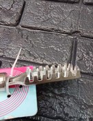 تصویر پولک گیر ماهی استیل 