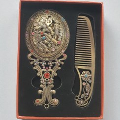 تصویر آینه و شانه فلزی طرح معرق 