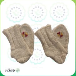 تصویر جوراب ساق بلند پشمی از محصولات طیبات با پشم گوسفند