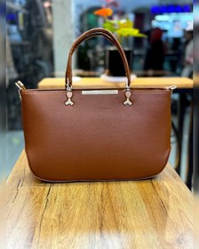 تصویر کیف زنانه چرم صنعتی مدل قایقی Women's Industrial Leather Handbag – Boat Style