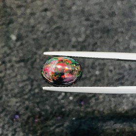 تصویر نگین اپال مشکی اصل تراش اوال سایز 12*9 