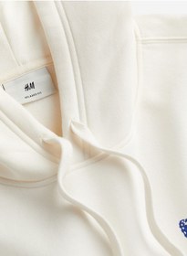 تصویر هودی گرافیکی با فیت راحت برند H&M Graphic Relaxed Fit Hoodie