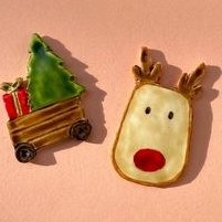 تصویر مگنت یخچال گوزن و‌ گاری کریسمس 