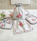 تصویر سرویس پارچه ای آشپزخانه عروس ۲۰تیکه رنگ نوار اریب ممکنه صورتی یا سبز باشه 