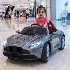 تصویر ماشین شارژی کودک برند استون مارتین مدل خوب aston martin baby chargi car