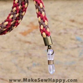 تصویر بند عینک بافت مدل برگ‌های پاییزی رنگ قرمز طلایی 