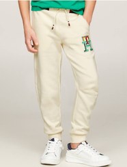 تصویر شلوار جین با آرم دوزی شده برای پسران - 100% پنبه، بژ برند Tommy Hilfiger Boys' Th Monogram Embroidery Cuffed Joggers - Pure cotton, Beige