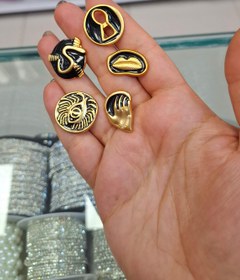 تصویر دکمه ترکیبی - طلایی مشکی 