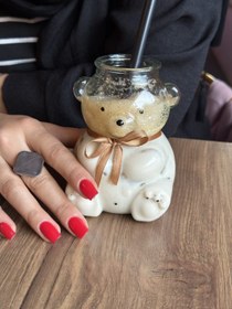 تصویر تدی نشسته شیشه ای 