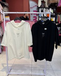 تصویر تیشرت باکسی کلاهدار پاپیون و یولو 