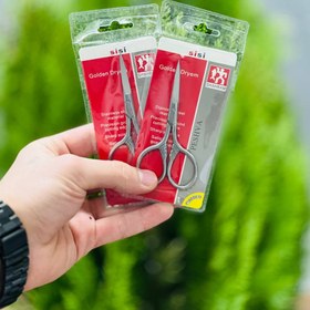 تصویر قیچی طوسی کارشده 