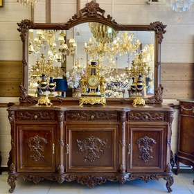 تصویر آینه و کنسول چوبی قهوه‌ای منبت کاری شده سه کمد و سه کشو غزال 