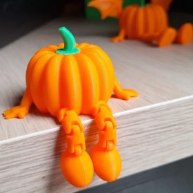 تصویر دکوری مینیاتوری مدل کدو تنبل با پای متحرک 