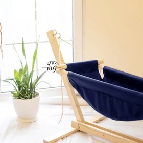 تصویر گهواره نوزاد مدل ننو چوبی 