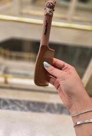 تصویر شونه خرسی کرم 