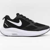 تصویر کتانی زنانه نایکی مدل گاید ۱۰ رنگ مشکی سفید با جنس اسپیسر 