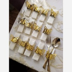 تصویر حلقه دستمال کاغذی و جاقاشقی چرم طلایی 