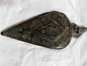 تصویر مهره یشم کهنه 