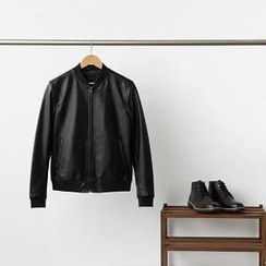 تصویر پکیج کاپشن چرم مردانه مدل Artim نیم بوت cat مردانه مدلRivari 