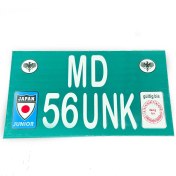 تصویر پلاک نیسان جونیور داخل گلگیر 