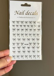 تصویر لنز ناخن برجسته طرح پاپیون مشکی 