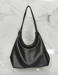 تصویر کیف چرم شل مدل هلالی جنس شرانک - شکلاتی 