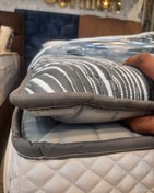 تصویر پد لاتکس روی تشک برمن مدل لیلی‌یانا ۹۰×۲۰۰. مخصوص گودی کمردرد و سری در بدن موقع خواب 